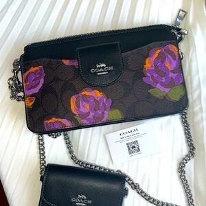 Brand new Michael Kors poppy crossbody in signature canvas with rose print.